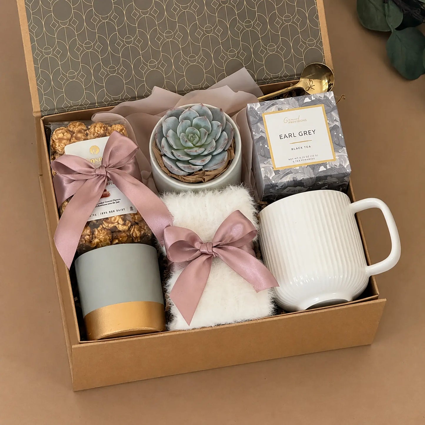 Discover cozy summer gift baskets and hygge-inspired care packages for birthdays, thank you gifts, self-care, and just because moments