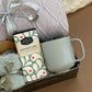 Snug & Warm Gift Set: Ceramic Mug, Throw Blanket, Premium Fuzzy Socks, Herbal Tea, Live Succulent & More