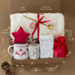 Warm Winter Hygge Gift Basket: Blanket, Holiday Mug, Hot Chocolate, Socks & More