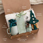 Extra Special Holiday Gift Basket for Her - Boho Blanket, Ceramic Candle Holder, Luxurious Socks, Minty White Tea, & Live Succulent