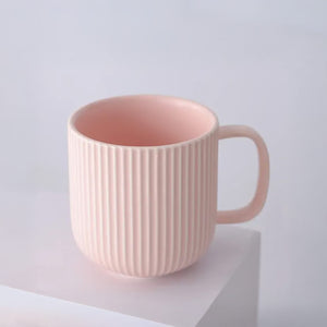 Pink ribbed ceramic mug