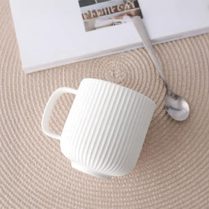 White ribbed ceramic mug