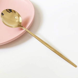 Golden dessert spoon